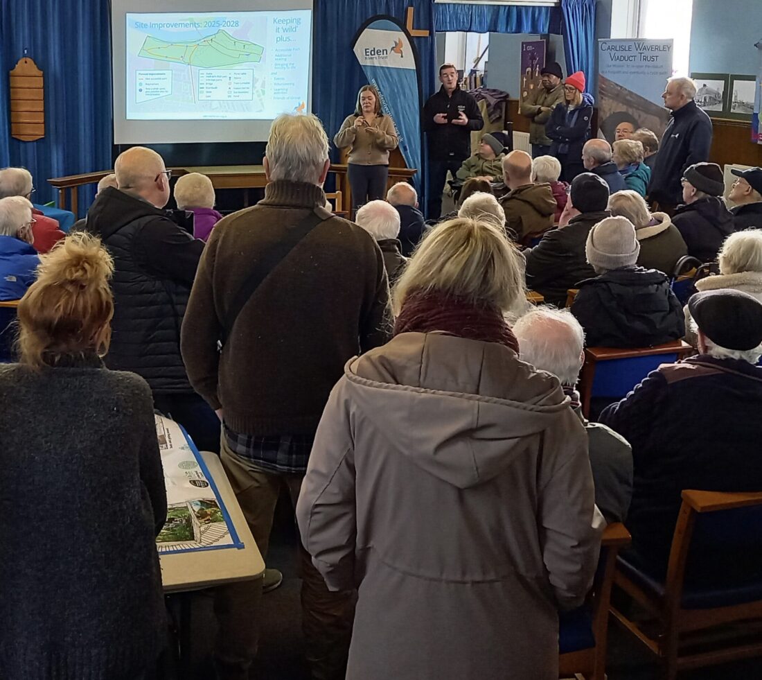 Audience at a community hall listening to a presentation given at an Engine Lonning community event discussing plans for the Access to Eden doorstep site.